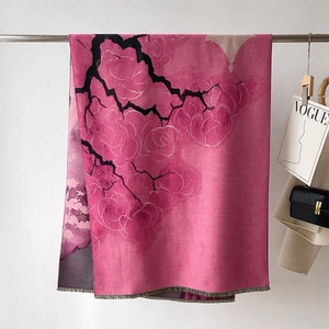 Detail of pink floral jacquard pashmina scarf with fine fringe edges and artistic pattern