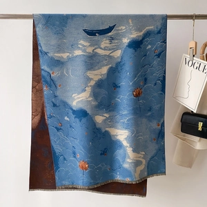 Detail of floral mountain print scarf with fringe edges and premium cashmere texture