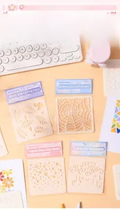 Close-up of 6-piece PET hollow painting stencils featuring leaf and cloud patterns
