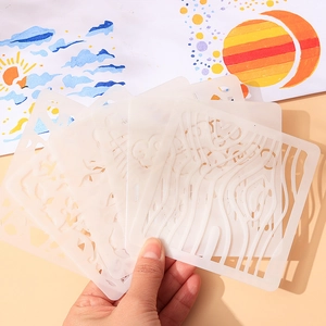 Stack of white translucent PET stencils with nature patterns for DIY painting and drawing