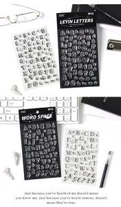Macro view of clear alphabet and number stamps set for DIY bullet journaling