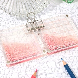 Palette en acrylique à paillettes roses avec 12 compartiments et pince en métal