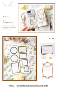 Close-up van vintage papieren stickers in bosgroen en beige voor scrapbooking en dagboeken