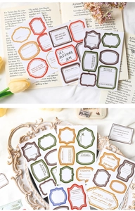 Macro-detail van vintage kaderstickers met artistieke belettering voor scrapbooking
