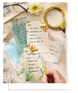 Floral notebook sticker set with tulip and lily of the valley patterns on wood desk