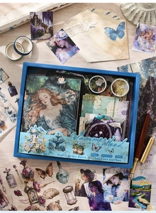 Flat lay of vintage floral scrapbook gift set with stickers, tapes and notebook