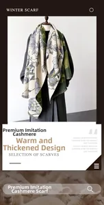 Detailed view of jacquard floral scarf in dark green with fringe and cashmere-like texture