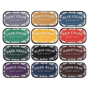 12-color water-based ink pad set for DIY stamps and crafts in a clear 3x4 grid layout