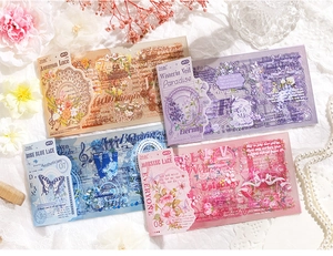 Macro di adesivi floreali in pizzo su tessuto bianco per progetti di scrapbooking fai-da-te