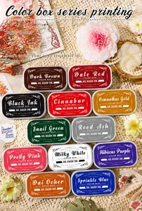 Macro detail of eleven high-density sponge oil-based ink pads for vintage scrapbooking