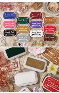 Detailed close-up of 12 vintage oil-based ink pads with sponge texture and vibrant colors