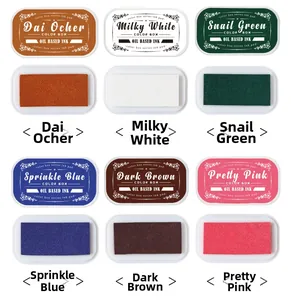 Close-up of 6 vintage oil-based ink pads for DIY journals in earthy and vibrant tones