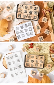 Detail of wooden stamp set with cute bear illustrations and metal storage box