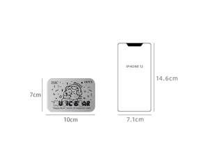 Cute tin storage box with 12 cartoon stamps, measuring 10x7cm next to a phone for scale