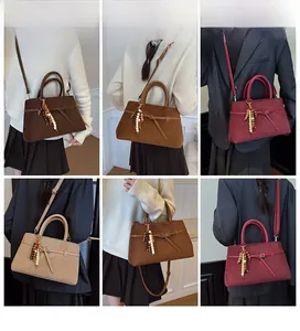 Collage of vintage matte leather tote bags in four colors shown on models in various poses