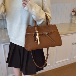 Vintage brown frosted leather tote bag with wooden beads and adjustable shoulder strap