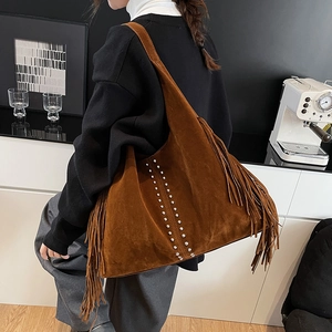 Retro caramel suede hobo bag with long tassels and silver studs decoration
