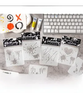 Detail of 6pcs ink-dyed heart stencils set on a desk with creative painting tools