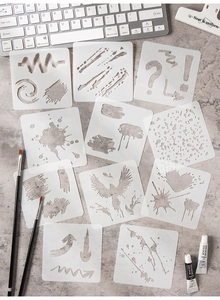 Detail of 11-piece translucent PET stencils with artistic ink splashes and birds