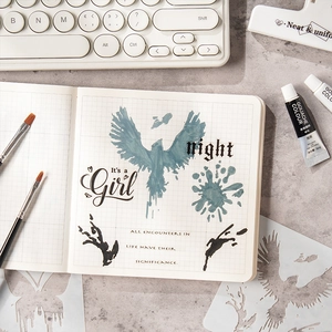 Artistic PET stencil set for DIY painting featuring birds and quotes on grid paper