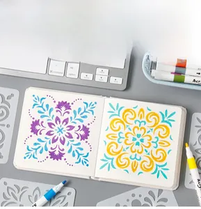 Detailed mandala stencils for journaling with acrylic markers on grid paper