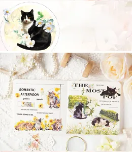 Detail of vintage cat PET stickers with floral motifs for DIY journals and scrapbooking