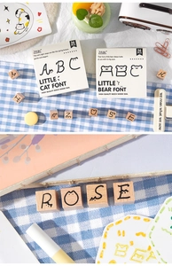 Macro shot of 36PCS wooden letter stamps for DIY scrapbooking and creative crafts