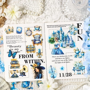 Vintage blue scrapbooking stickers with gold accents for elegant DIY journals