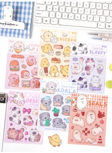 Close-up of cute 3D cartoon animal stickers set for DIY phone cases and journals
