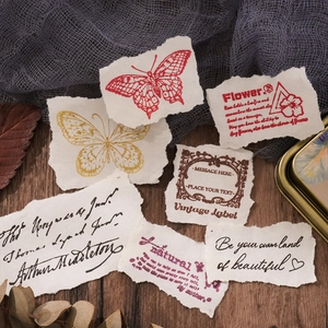 Retro vintage label stamps in metal box for scrapbooking and creative DIY art decor