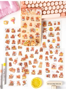 Close-up of 6pcs cute cartoon Capybara stickers set for DIY scrapbooking and planners