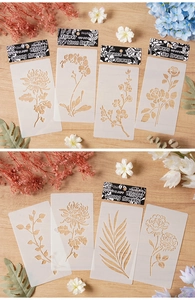 Dettaglio di stencil per pittura a fiori su uno sfondo di legno in stile rustico