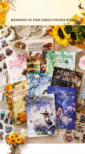 Detail of vintage scrapbooking sticker books featuring artistic nature themes and die-cut shapes