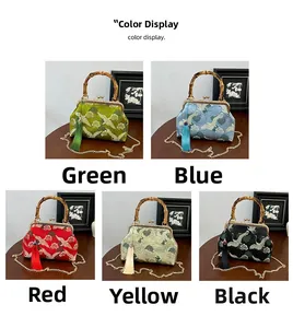 Detail view of oriental silk embroidery bags with bamboo handles in five elegant colors