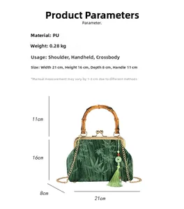 Detail of green velvet bag with bamboo handle, gold chain and decorative silk tassel
