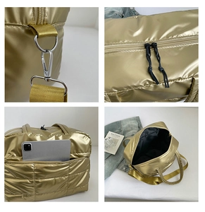 Detail view of large gold quilted tote bag with metallic hardware and laptop compartment