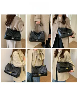 Multi-angle view of black quilted tote bag with metal chain straps and chic texture
