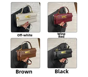 Dettaglio della trama intrecciata e della chiusura a scatto dorata della borsa Kelly