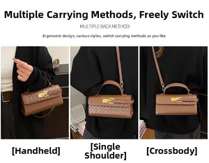 Detail view of woven texture brown Kelly handbag with gold lock and adjustable strap