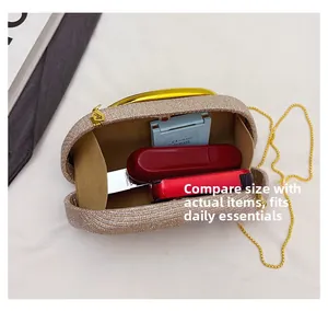 Detail of sequin evening bag interior showing capacity for lipstick and makeup items
