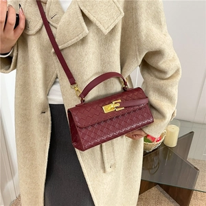 Elegant wine red woven leather crossbody bag with gold twist lock and top handle