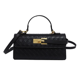 Black woven leather crossbody bag with elegant gold lock and handle on white background