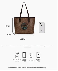 Detailed view of retro embossed tote bag showing capacity for phone and essentials