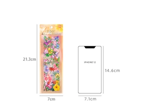 Größenvergleich der Amber Streamer Blumensticker 21,3x7cm neben einem Smartphone-Rahmen