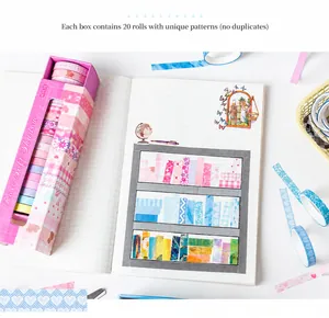 Detail shot of 20 rolls of assorted washi tapes with floral and grid patterns for scrapbooking