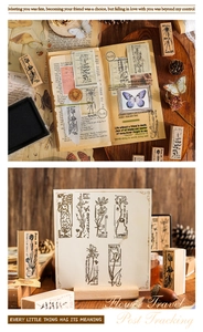 Detail of vintage wooden botanical stamps featuring floral and butterfly rubber designs