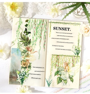 Detailed view of floral fairy PET tapes and vine stickers on a minimalist journal layout