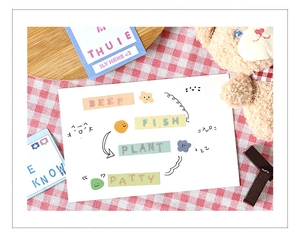 Detail of DIY journal stickers with colorful food labels and cute doodle expressions
