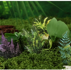 Macro detail of translucent fern leaf PET stickers on moss background for journaling