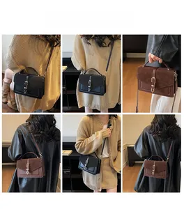 Detailed views of vintage crossbody bag with buckle, showing hand-carry and shoulder styles